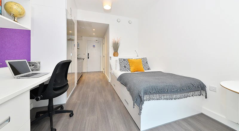 Desk bed chair and globe Student room at 88 Bromsgrove House in Birmingham Student Accommodation