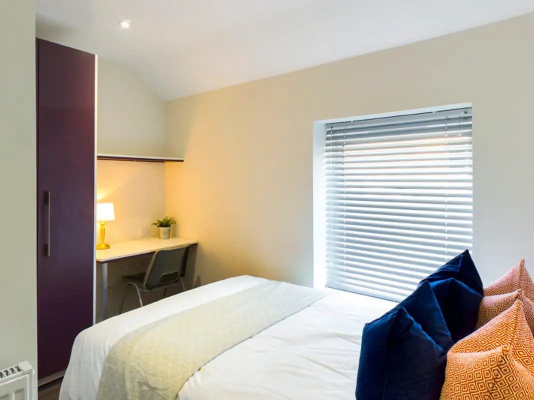 Wardrobe desk lamp and bed Bedroom at 21 Queen Anne Street in Stoke-On-Trent Student Accommodation