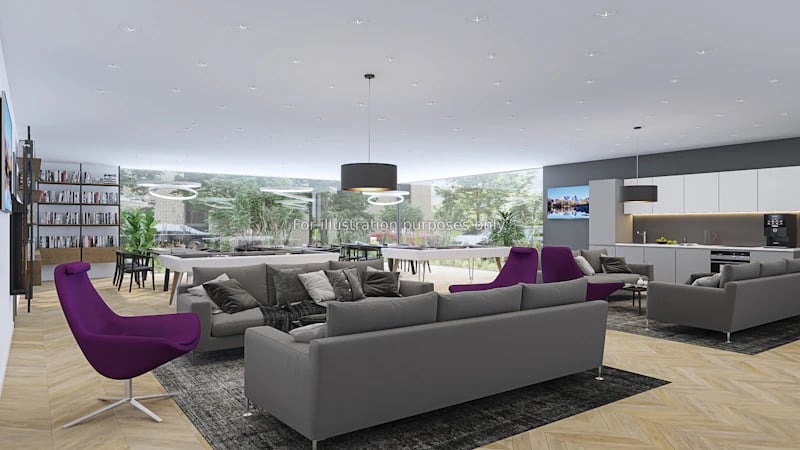 Sofa chairs coffee tables bookshelves kitchen area living room at Aire in Stoke-On-Trent Student Accommodation