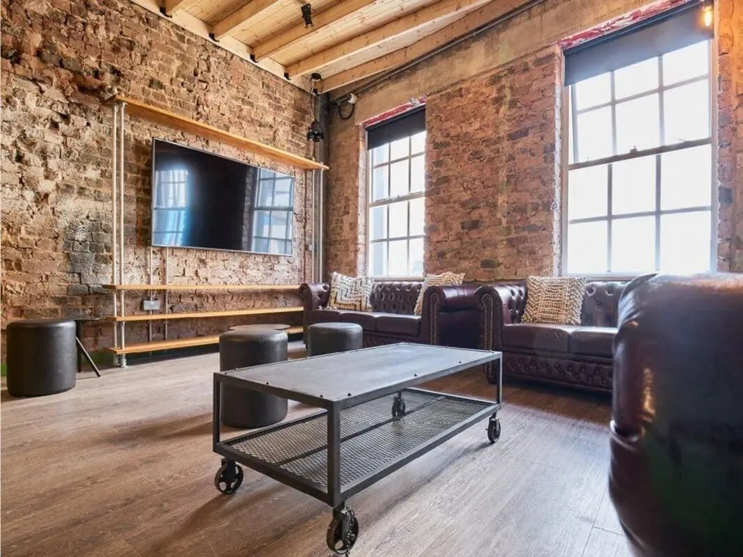 Leather sofas and coffee table living room at The Lantern in Liverpool Student Accommodation
