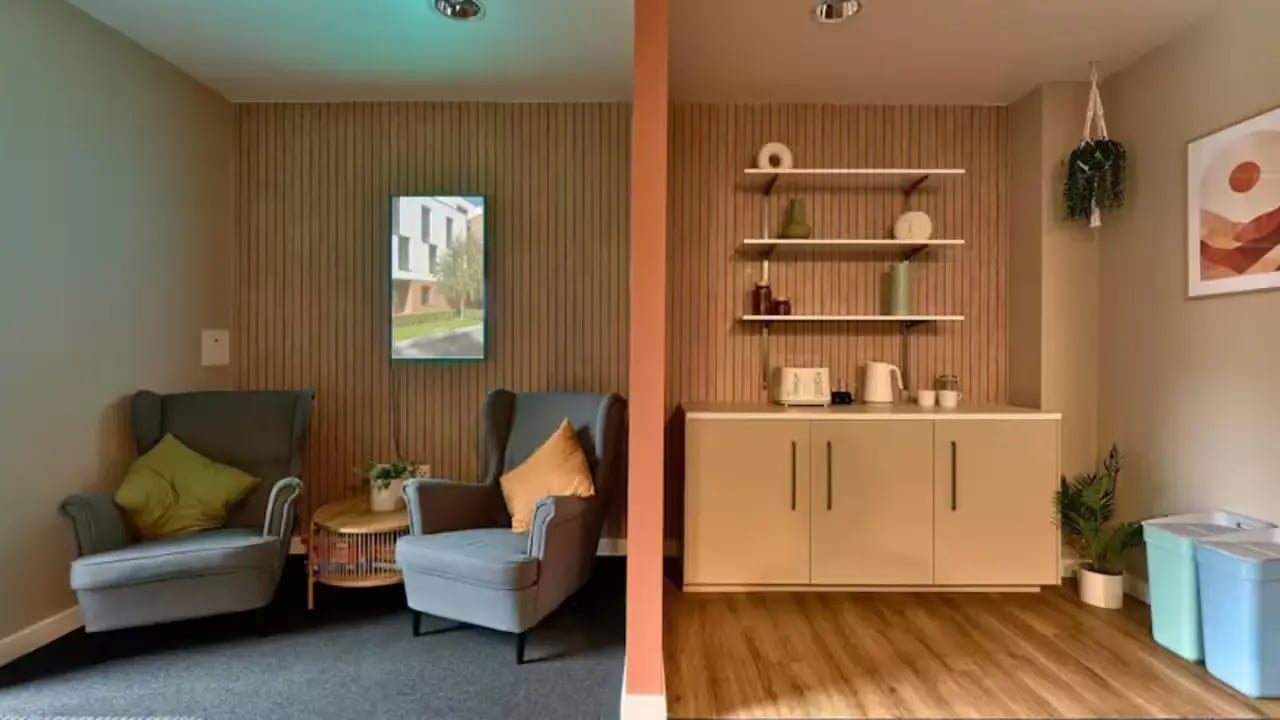 Two armchairs and kitchenette counter with toaster kitchen at The Apollo Works in Coventry Student Accommodation