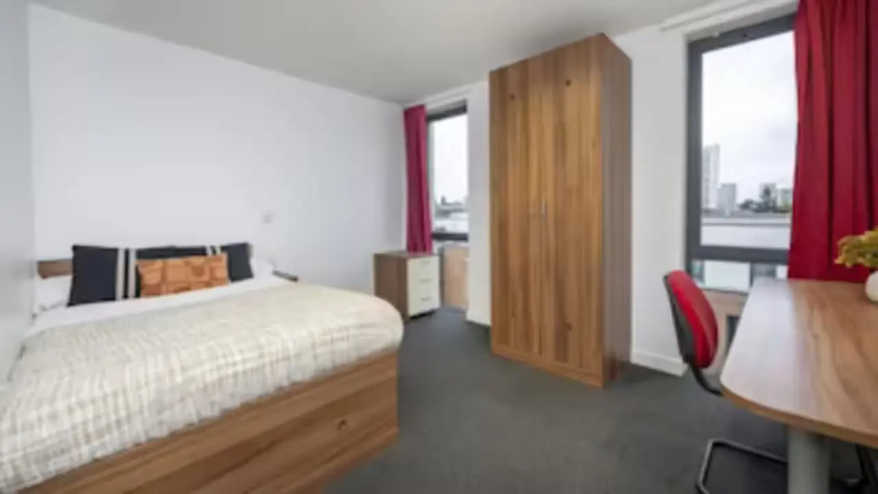 Bed wardrobe desk and chair bedroom at The Apollo Works in Coventry Student Accommodation