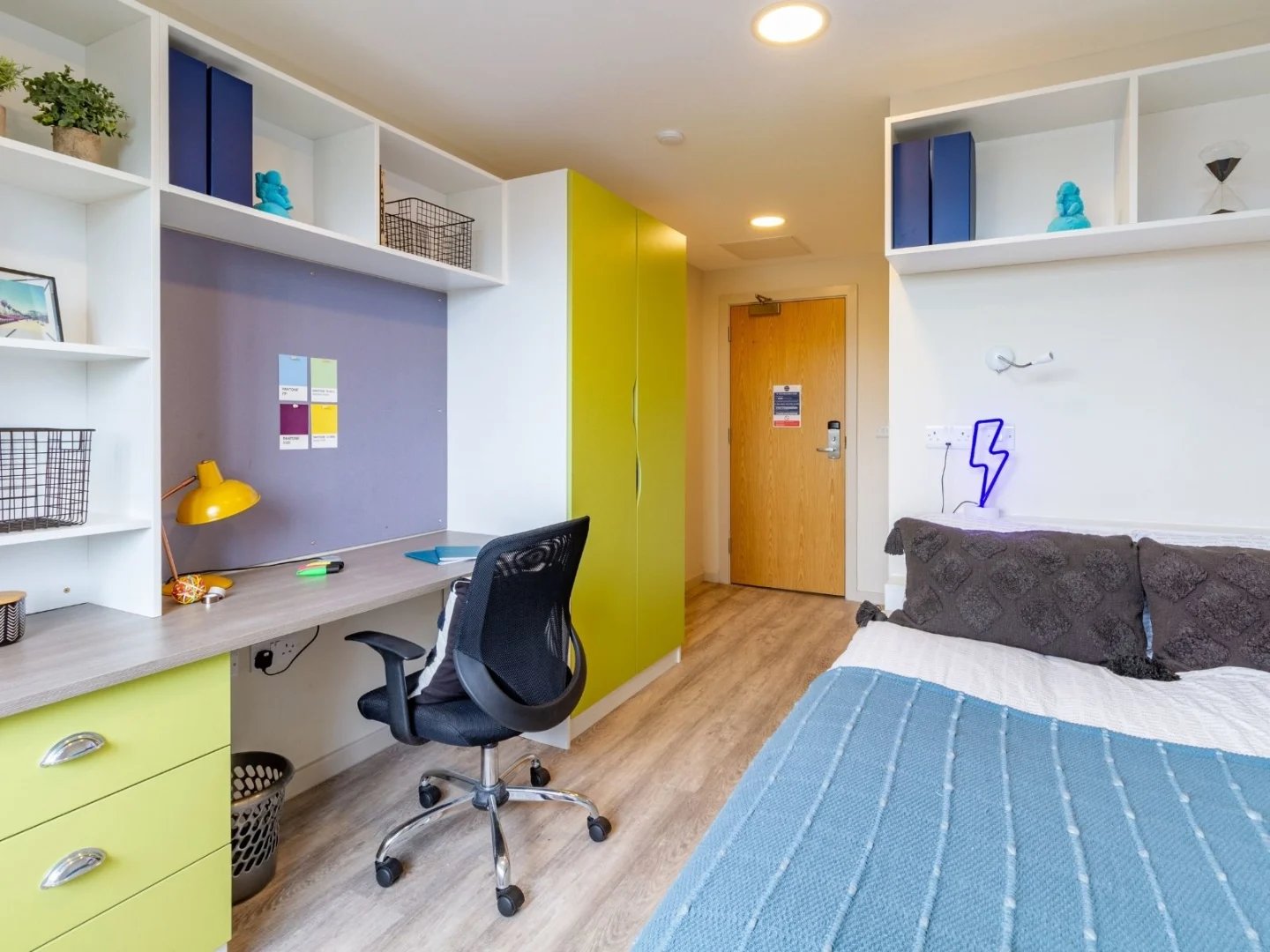 Desk chair lamp bed wardrobe study area bedroom at The Barn in Exeter Student Accommodation