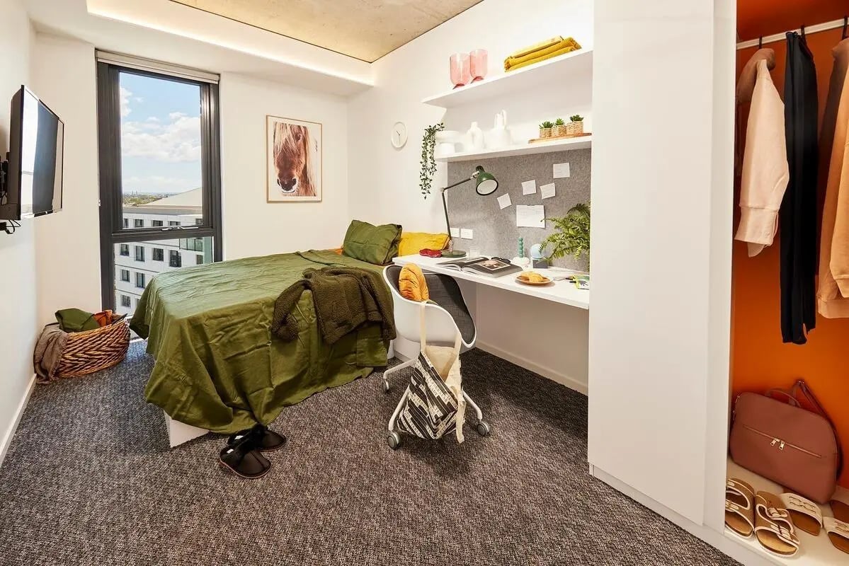 Bed desk closet shoes and decor Bedroom at Scape Redfern in Sydney Student Accommodation