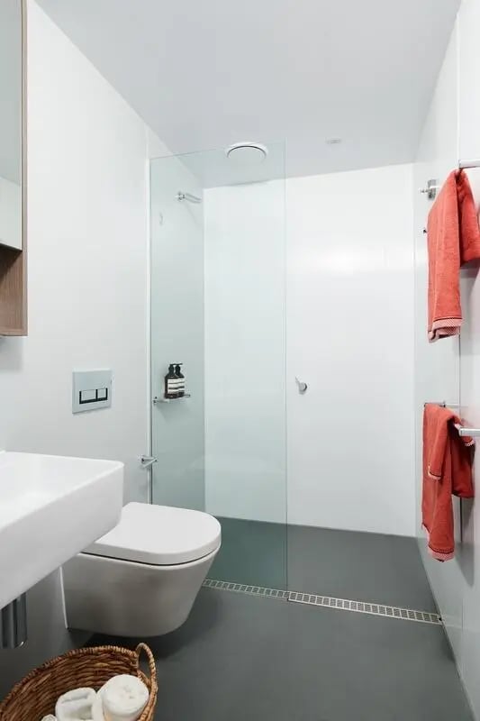 Modern bathroom with white toilet and shower enclosure bathroom at Scape Cornell Place in Melbourne Student Accommodation
