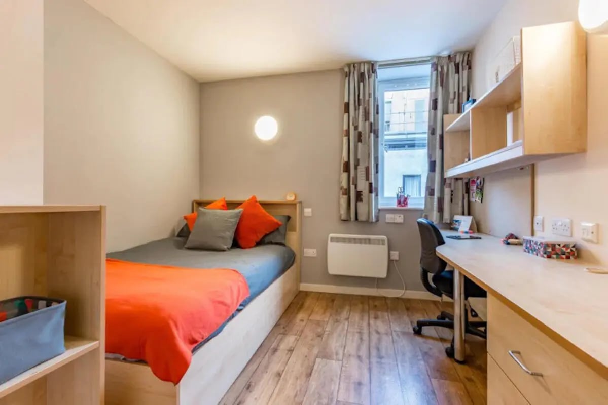 Bed desk and shelves bedroom at Chambers 51 in Wolverhampton Student Accommodation