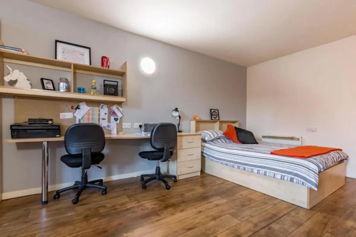 Two desks chairs printer shelves bed bedroom at Chambers 51 in Wolverhampton Student Accommodation