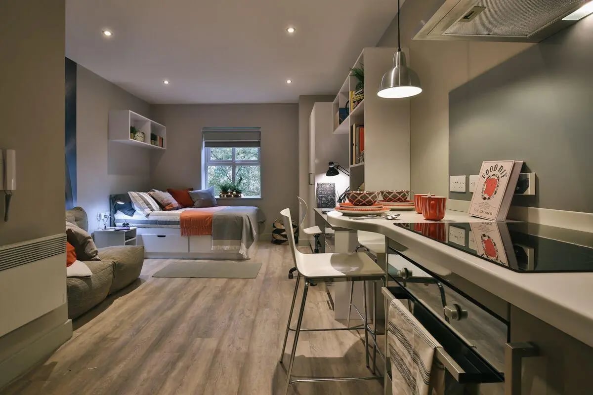 Bed kitchen area and seating area studio at Kingsmill Studios in Huddersfield Student Accommodation