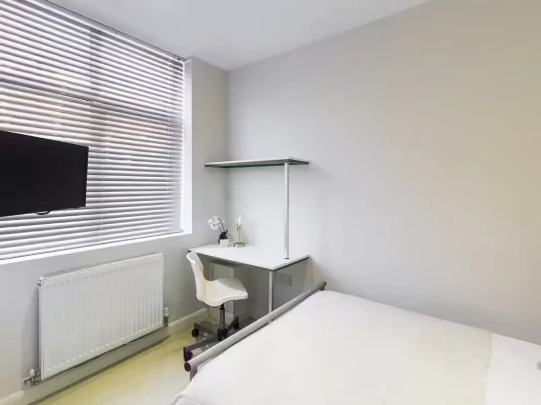 Bed desk chair radiator TV window bedroom at 31 Guildford Street in Stoke-On-Trent Student Accommodation