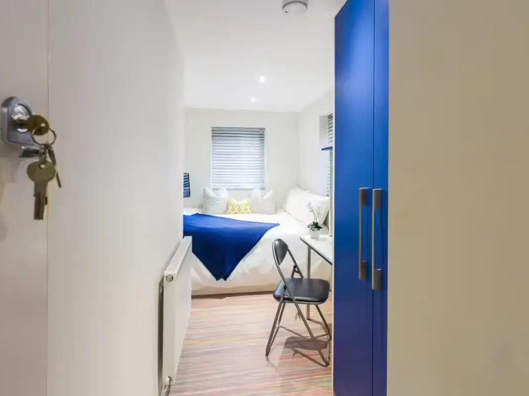 Bed desk chair and wardrobe bedroom at 6 Cauldon Road in Stoke-On-Trent Student Accommodation