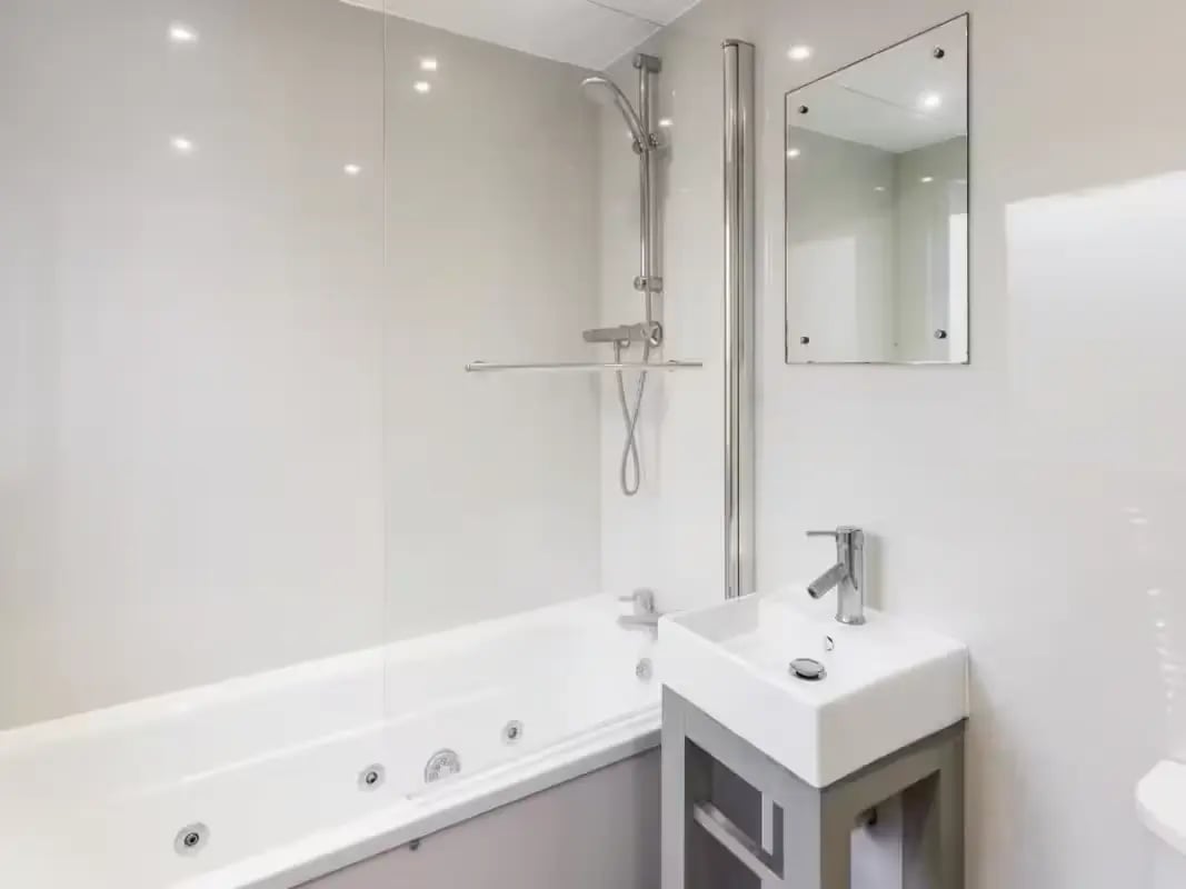 Bathtub sink and mirror Bathroom at 6 Cauldon Road in Stoke-On-Trent Student Accommodation