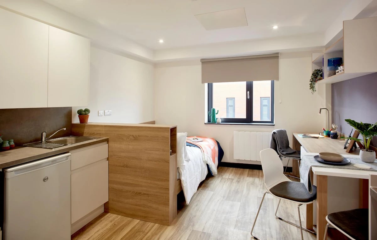 Kitchen bed desk chairs and window studio at Eden Square in Coventry Student Accommodation