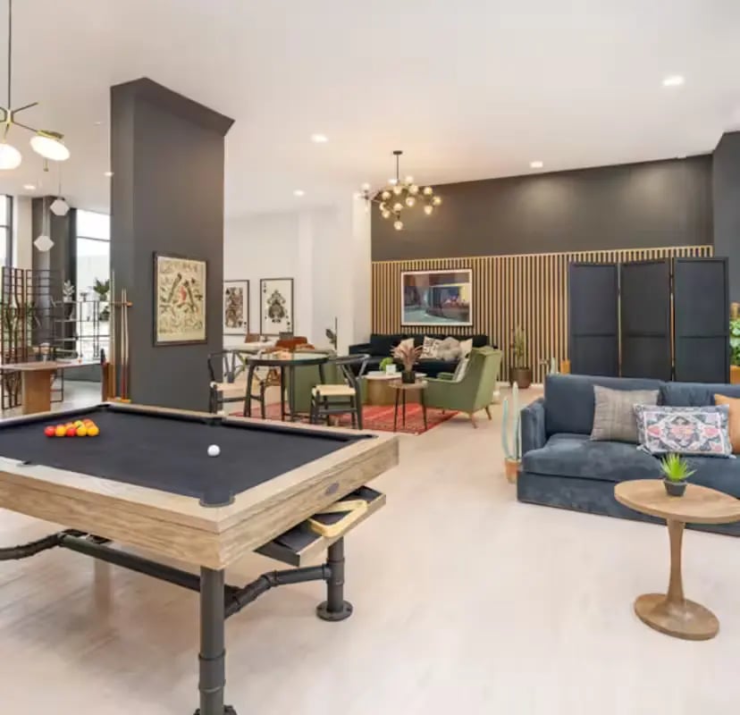 Pool table furniture art and seating area lounge at Zinc Quarter in Bristol Student Accommodation
