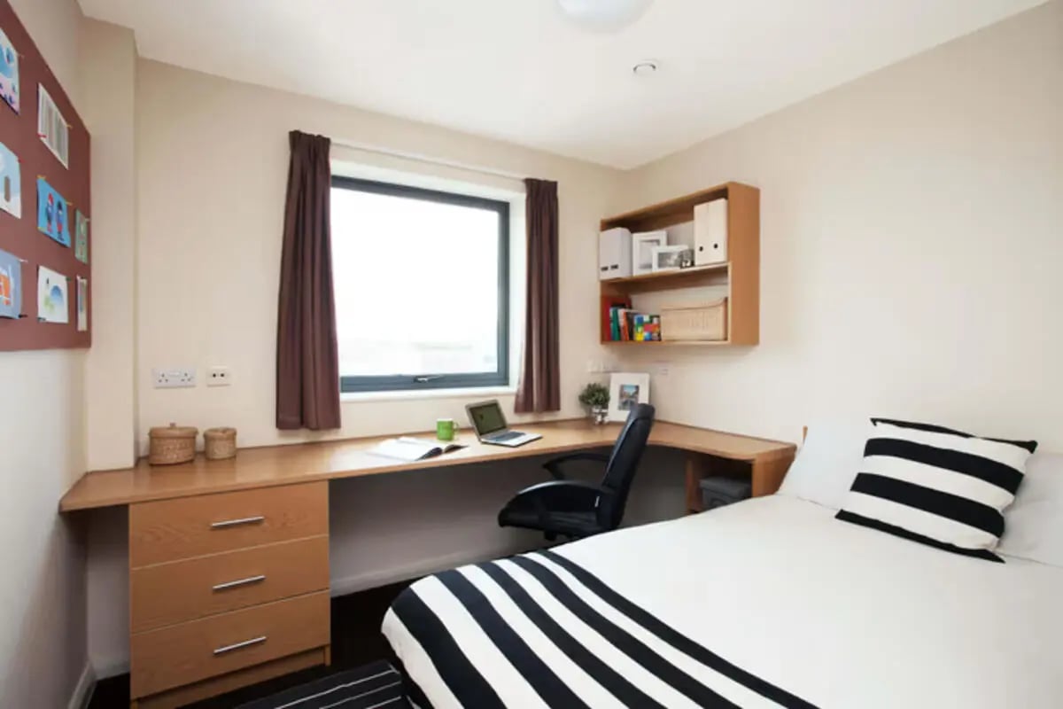 Desk drawers laptop chair bed bedding bedroom at Waterways in Loughborough Student Accommodation