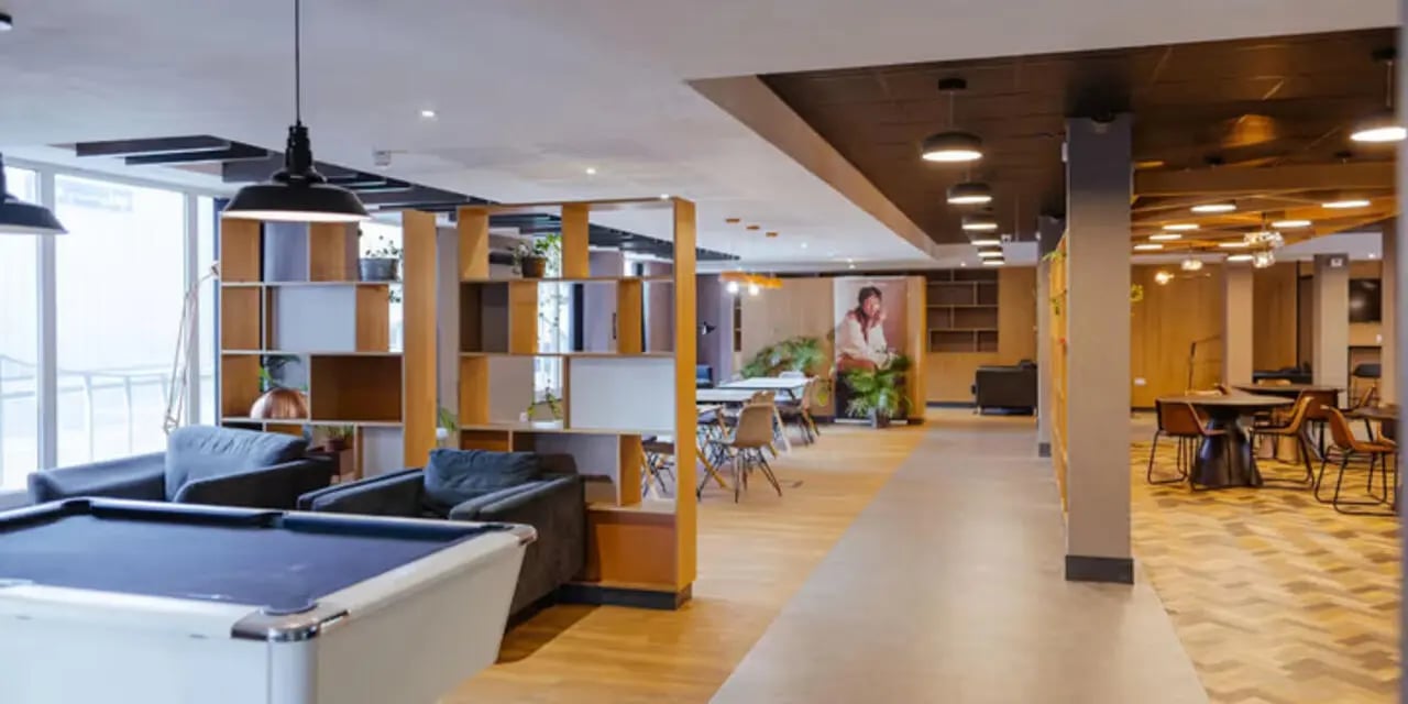 Pool table couches tables and shelves common area at The Heights in Birmingham Student Accommodation