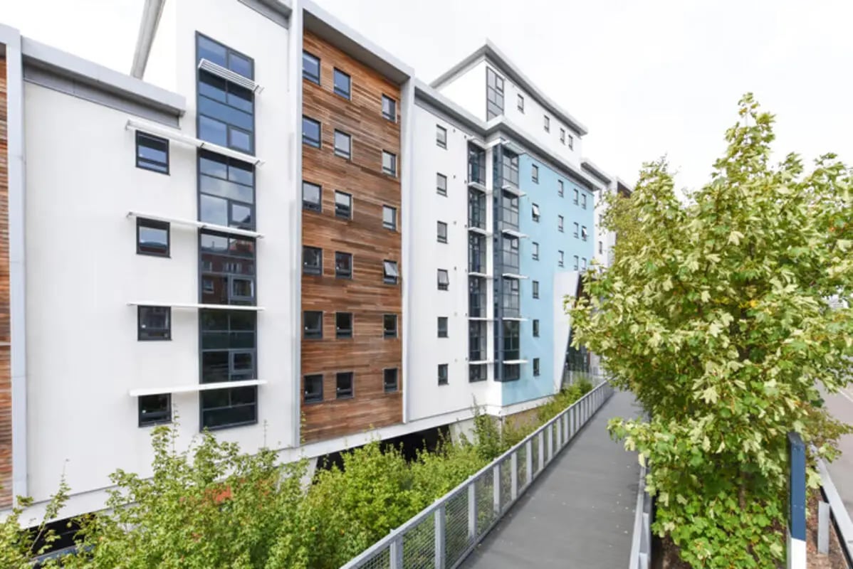 Modern buildings with wood and blue accents exterior at Newcastle 1 in Newcastle Upon Tyne Student Accommodation