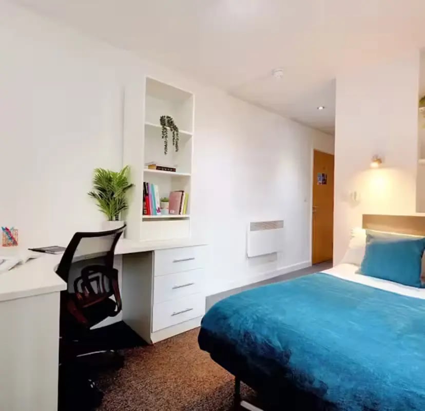 Desk bookcase chair bed student bedroom at Newarke Street Leicester in Leicester Student Accommodation
