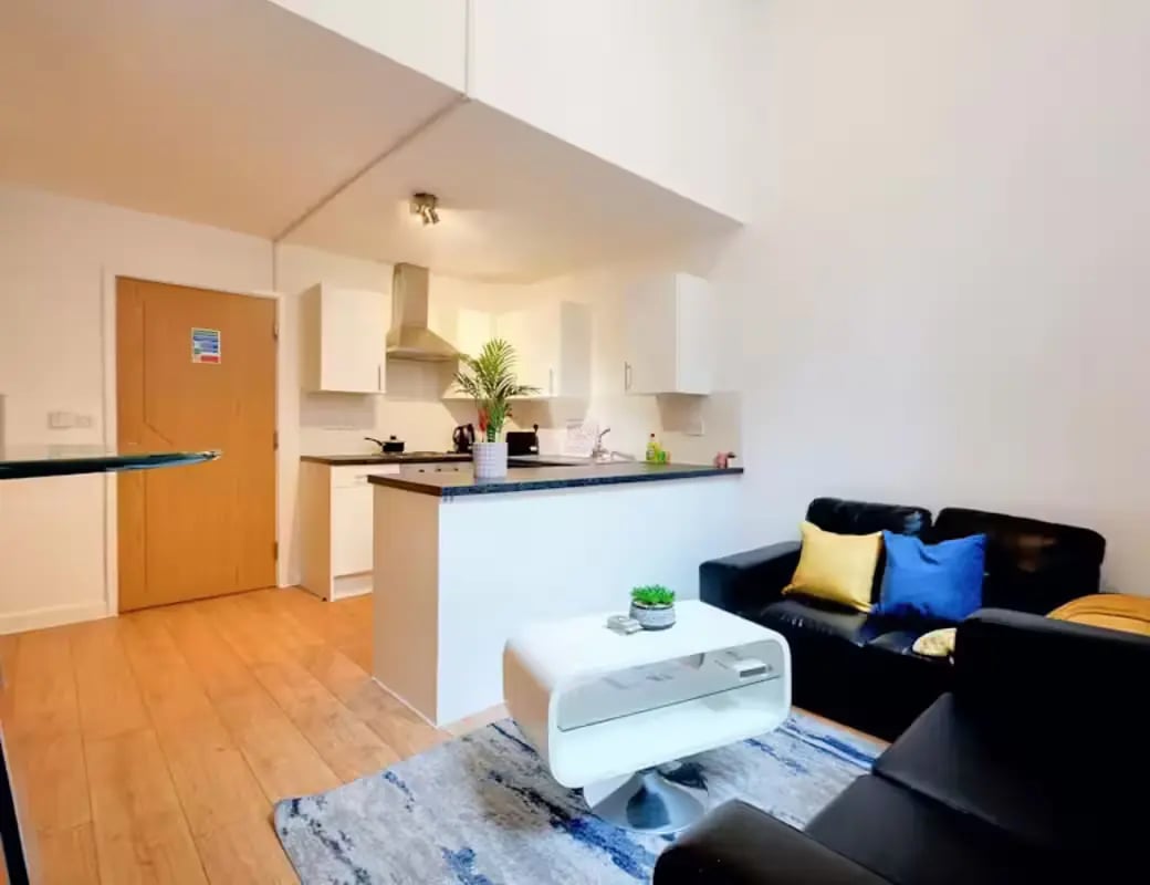 Modern kitchen living area with sofas living area at Newarke Street Leicester in Leicester Student Accommodation