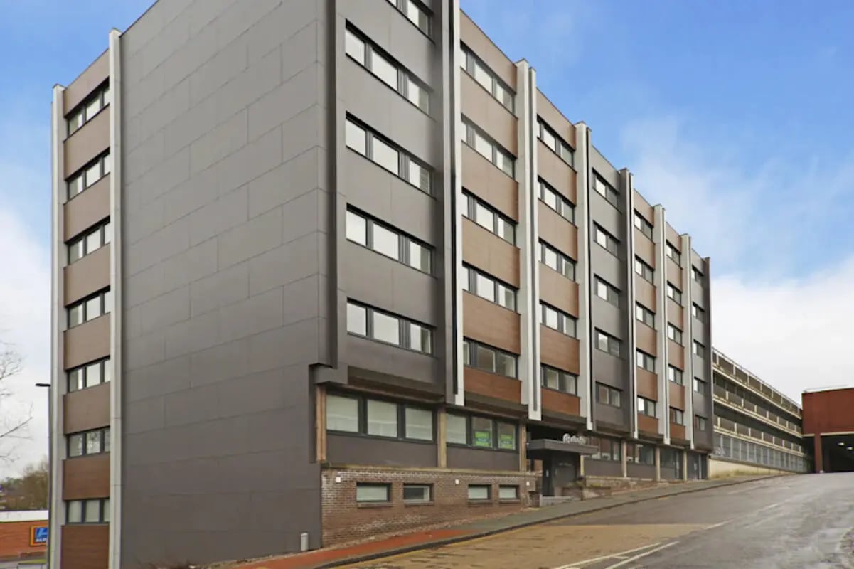 Modern building with multiple floors and windows exterior at Keele House in Newcastle Under Lyme Student Accommodation