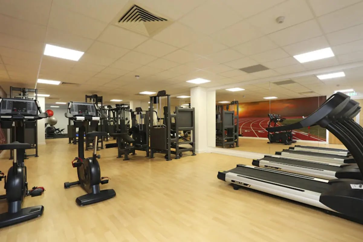 Treadmills exercise bikes weight machines gym interior at Keele House in Newcastle Under Lyme Student Accommodation