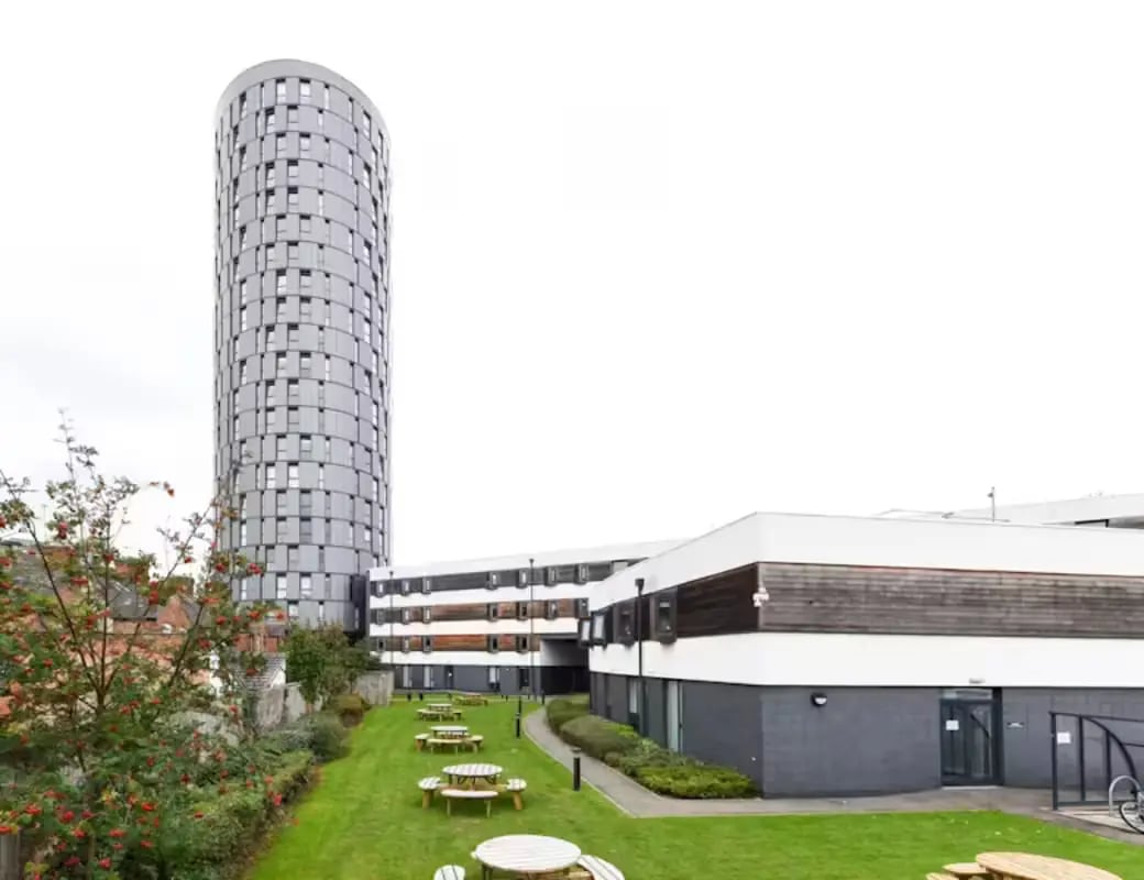 Modern accommodation buildings with round tower exterior at The Summit Leicester in Leicester Student Accommodation