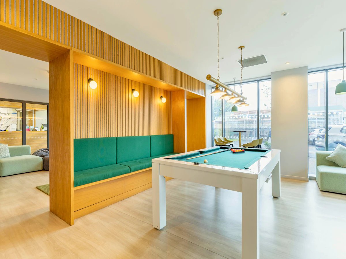 Pool table with seating area living room at Straits Meadows in Edinburgh Student Accommodation