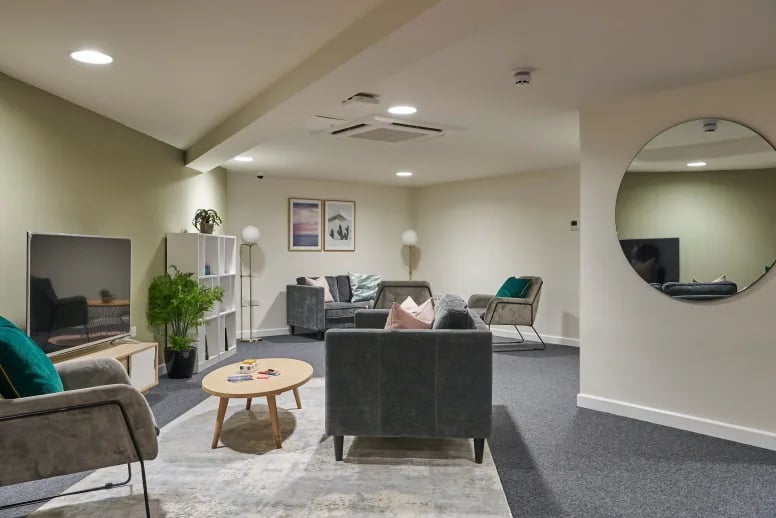 Comfortable sofas television and coffee table living room at The Bank Southampton in Southampton Student Accommodation