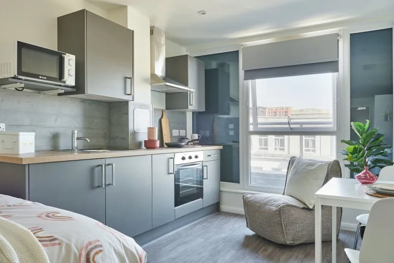 Bed kitchen study area living room at The Bank Southampton in Southampton Student Accommodation