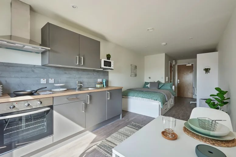 Kitchen area bed and table student studio at The Bank Southampton in Southampton Student Accommodation