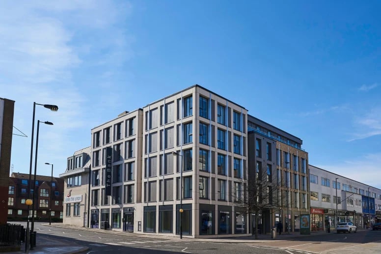 Modern student accommodation building with large windows exterior at The Bank Southampton in Southampton Student Accommodation