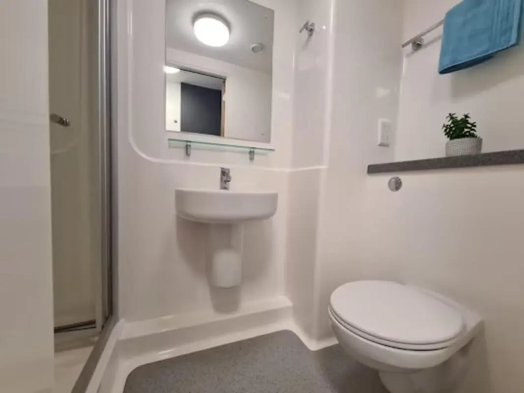 Sink toilet shower and mirror bathroom at St James Point in Newcastle Upon Tyne Student Accommodation