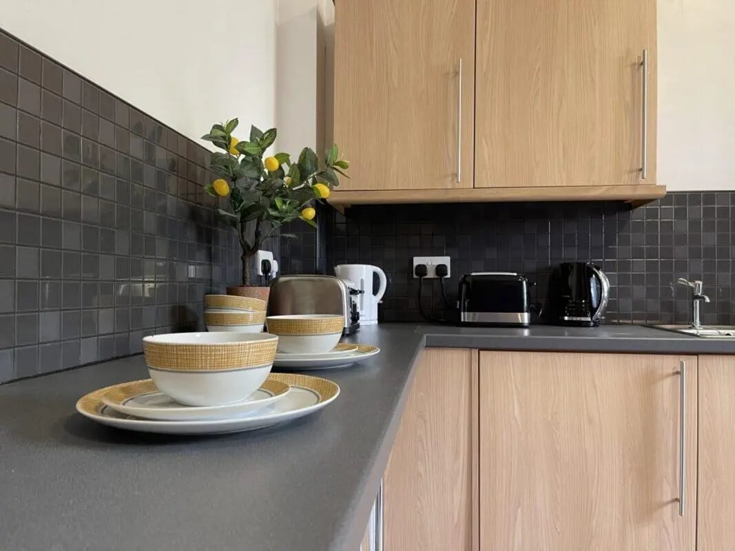 Bowls toasters kettle plant kitchen counter kitchen at St Mary's Newcastle in Newcastle Upon Tyne Student Accommodation
