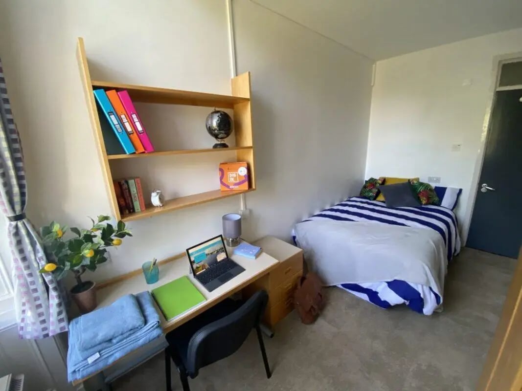 Desk bed shelf laptop books Globe bedroom at St Mary's Newcastle in Newcastle Upon Tyne Student Accommodation