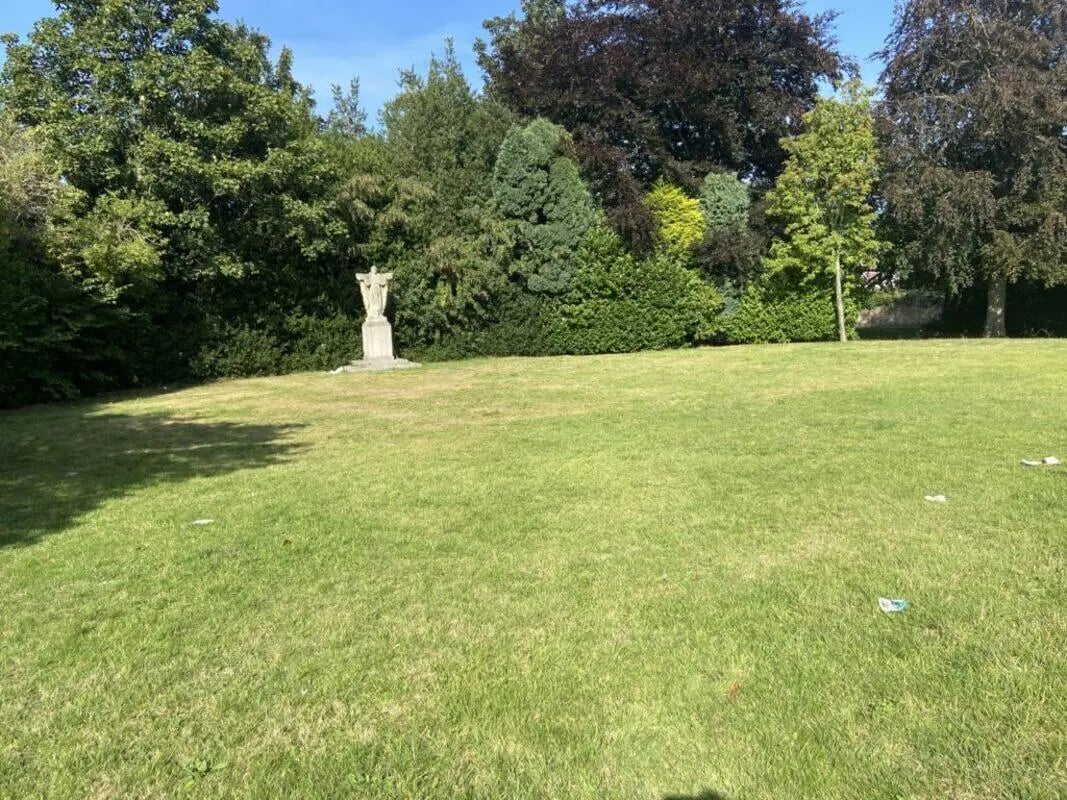 Statue in grassy lawn with surrounding trees exterior at St Mary's Newcastle in Newcastle Upon Tyne Student Accommodation