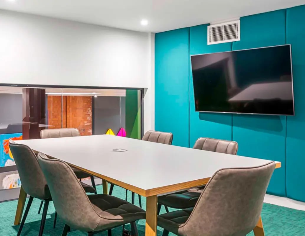Table chairs and television in study area at Gravity in Lincoln Student Accommodation