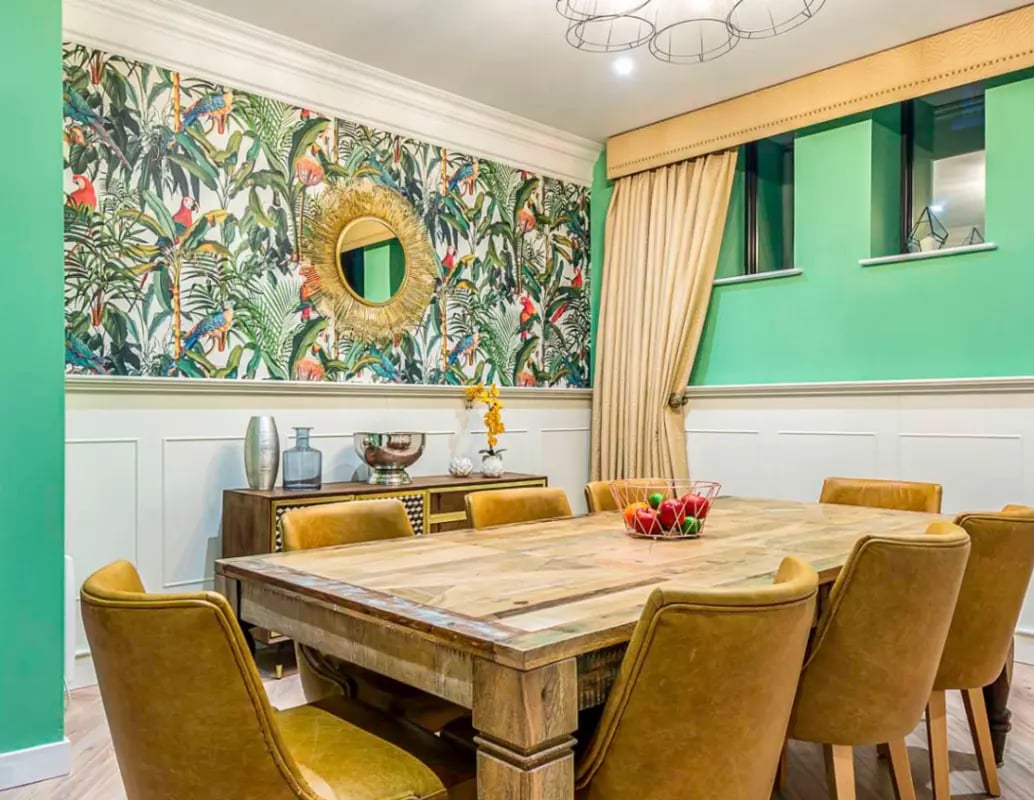Dining table with chairs and tropical wallpaper Dining room at Gravity in Lincoln Student Accommodation