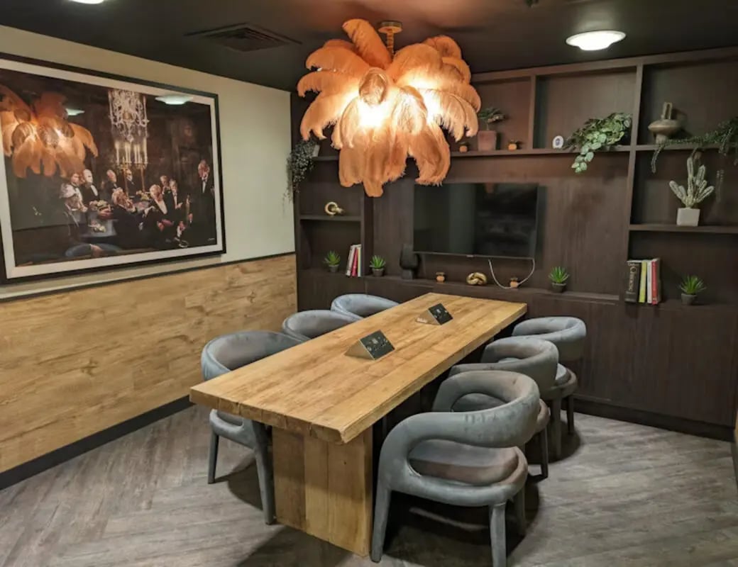 Large wooden table and chairs communal area at St James House in Newcastle Upon Tyne Student Accommodation