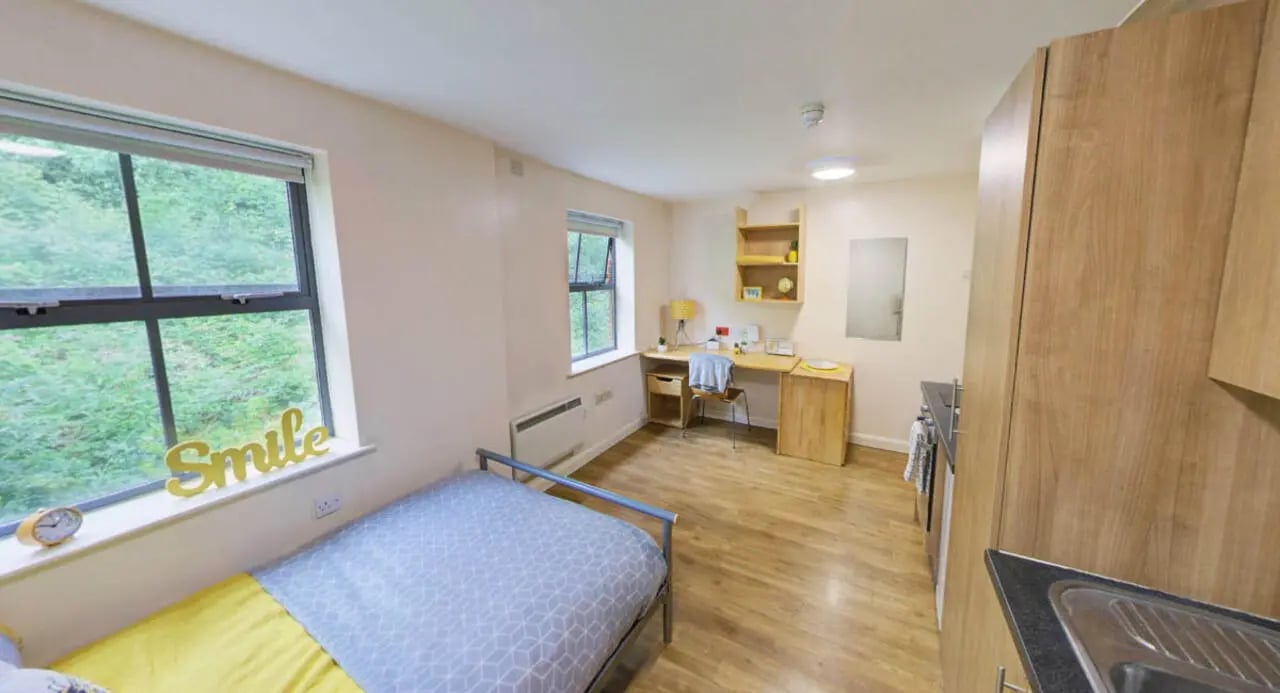 Bed desk shelves cabinets kitchen student studio at dwell Hotwells House in Bristol Student Accommodation