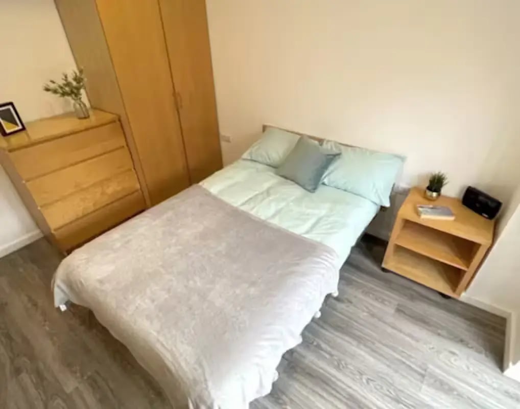 Bed dresser wardrobe bedside table bedroom at Page Apartments @ Central Place in Sheffield Student Accommodation