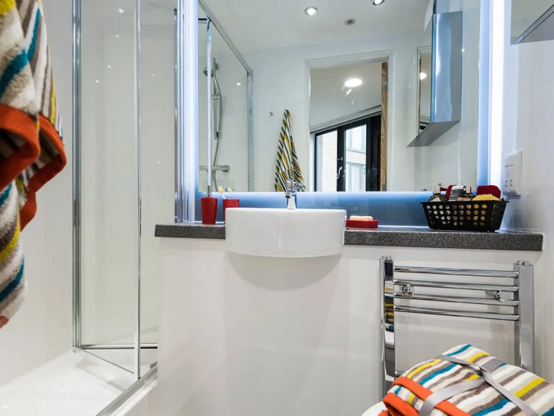 Shower sink and towel rack bathroom at New Bridewell in Bristol Student Accommodation