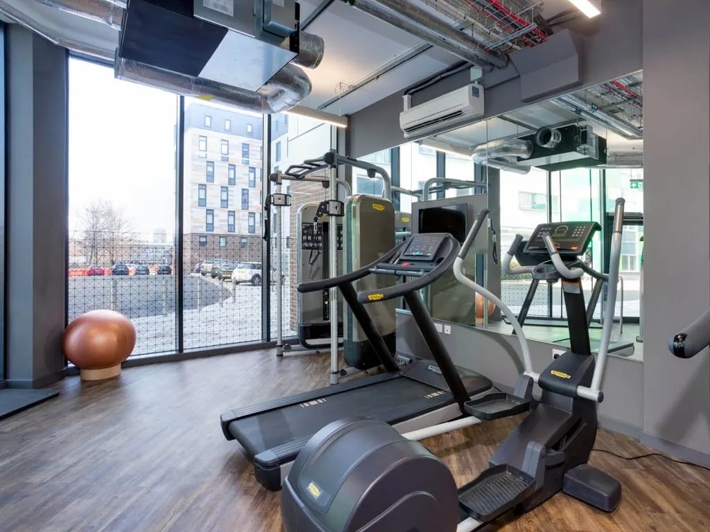 Treadmills elliptical exercise machines gym playing area at The Shield in Newcastle Upon Tyne Student Accommodation