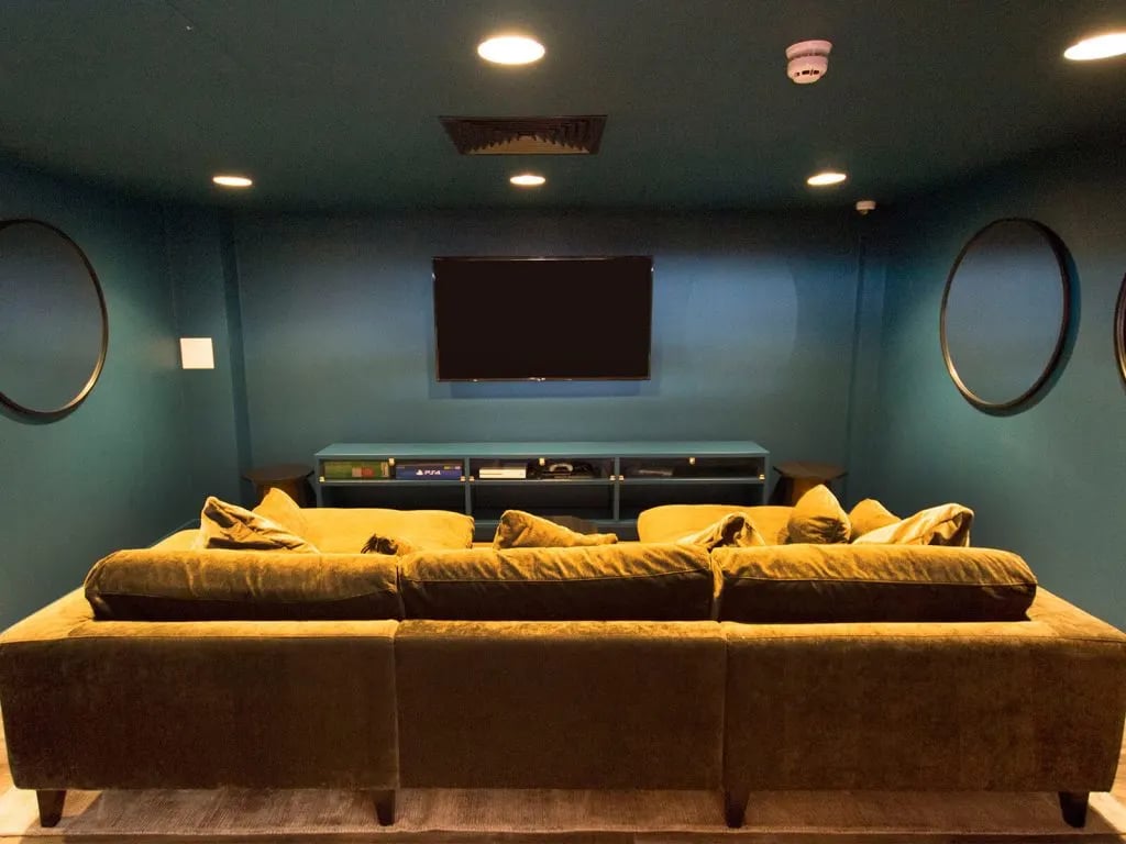 Sofa television media console mirrors living room at The Shield in Newcastle Upon Tyne Student Accommodation