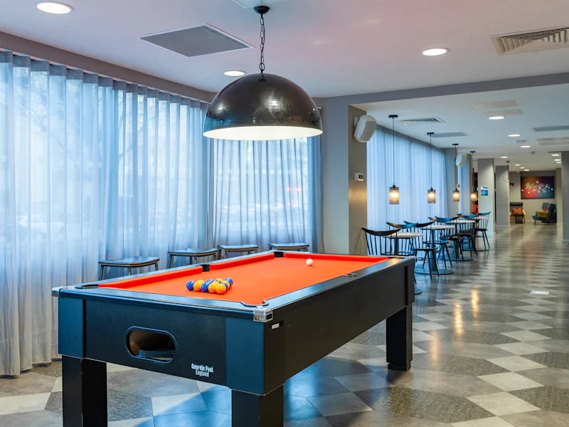 Pool table tables and chairs lounge area at The Fitzalan in Cardiff Student Accommodation