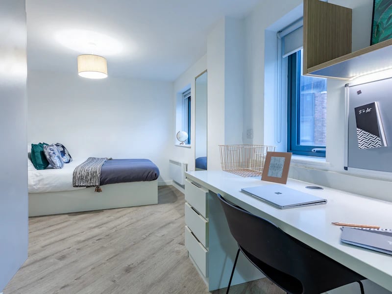 Bed desk and chair in a student bedroom bedroom at The Fitzalan in Cardiff Student Accommodation