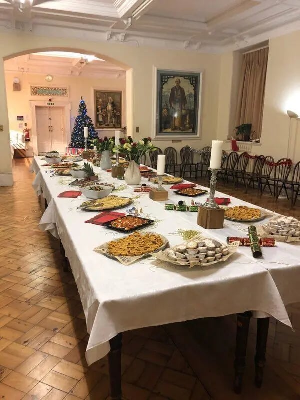 Festive table with food Christmas decorations event at Queen Alexandra's House in London Student Accommodation