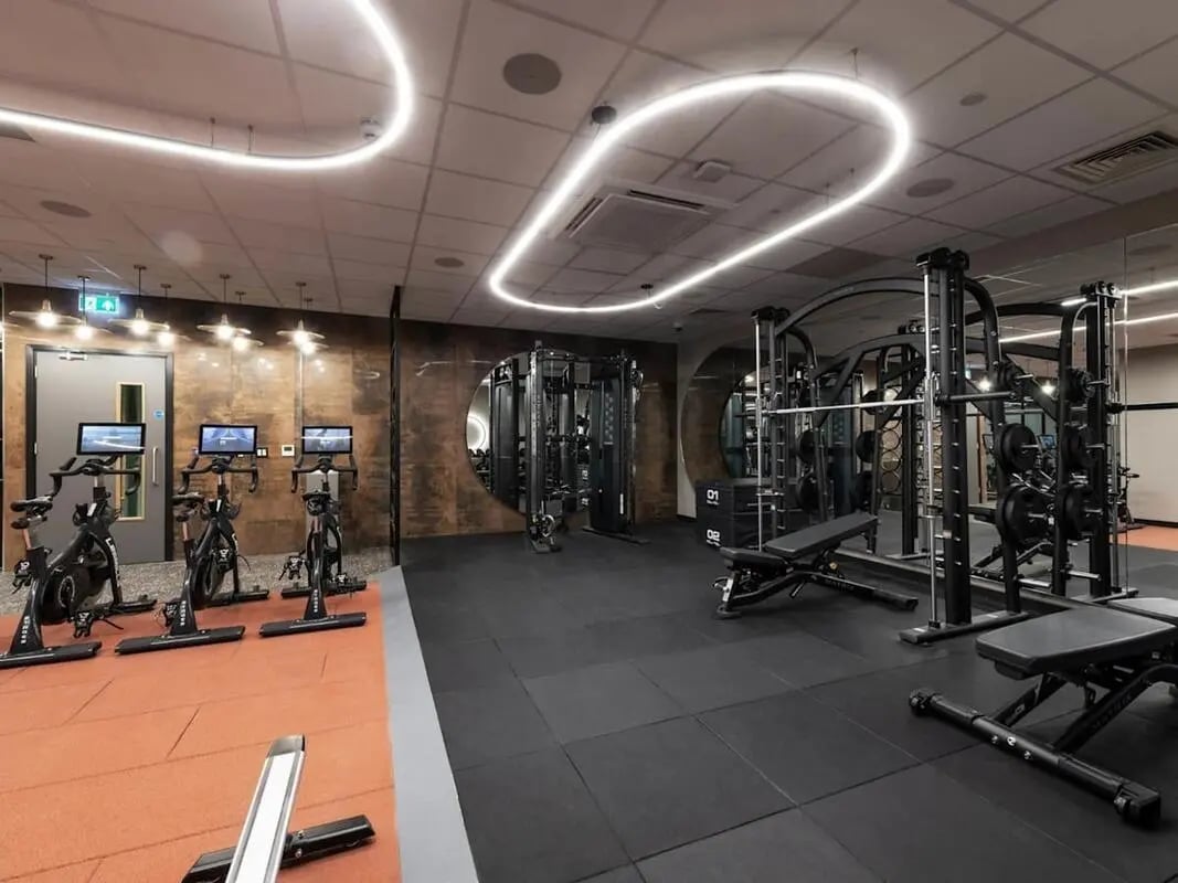 Stationary bikes weight racks and benches gym at Alma Place in Belfast Student Accommodation