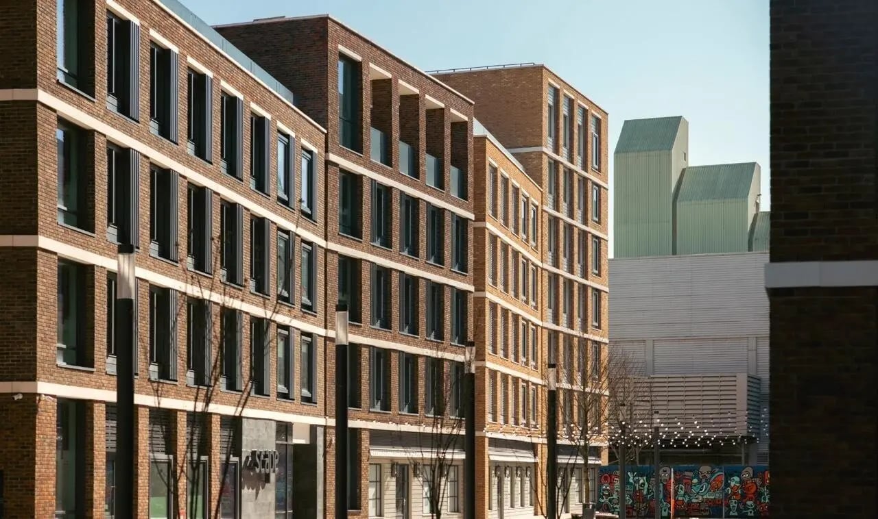 Modern brick building with multiple windows exterior at Scape Canada Water in London Student Accommodation