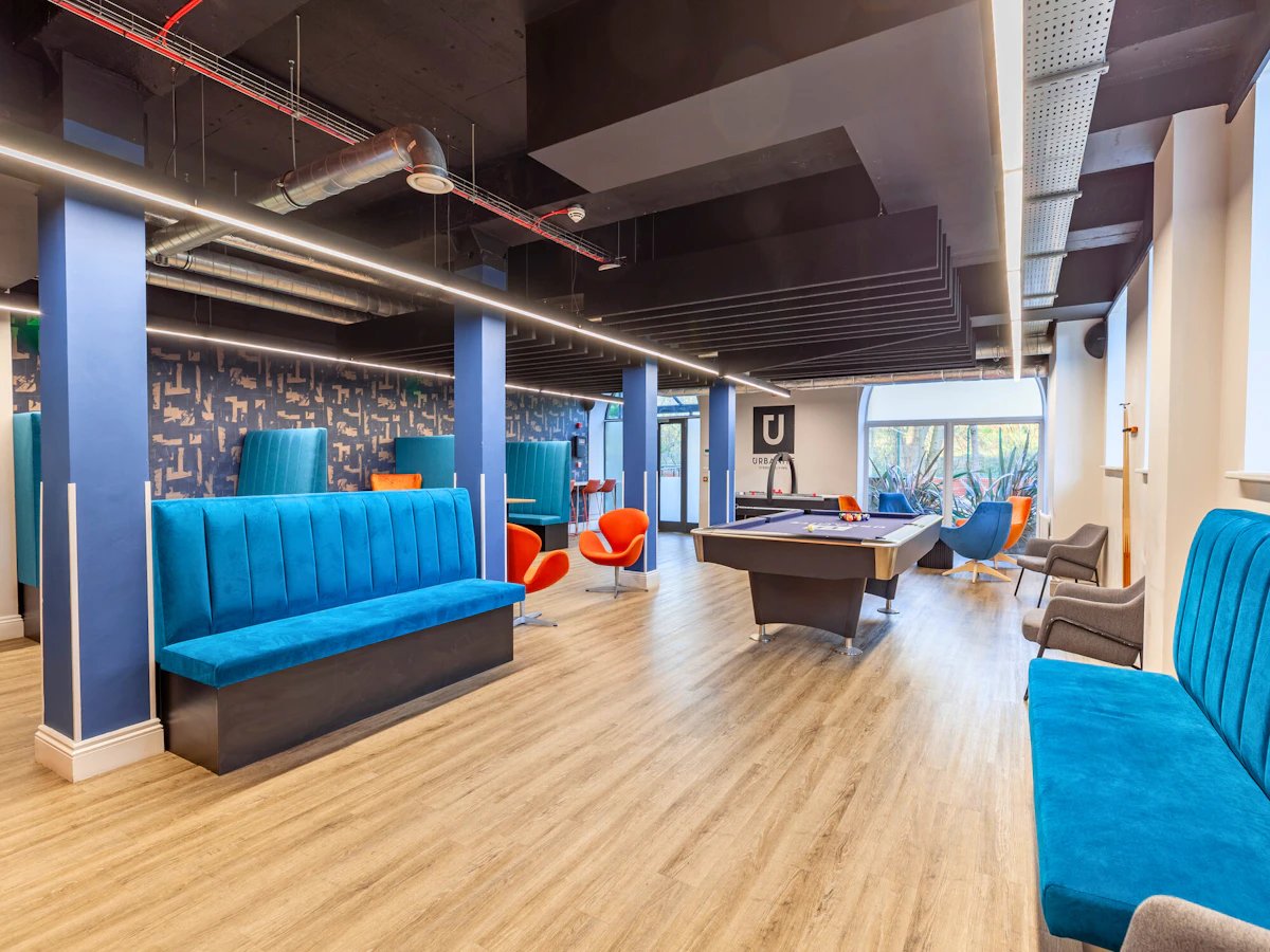 Blue booths pool table and chairs communal area at The Leather Works in Leeds Student Accommodation