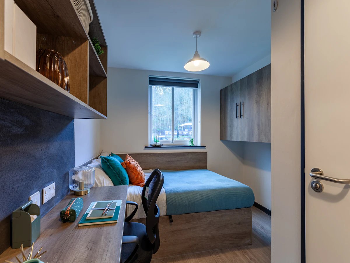 Bed desk storage shelving window bedroom bedroom at The Leather Works in Leeds Student Accommodation