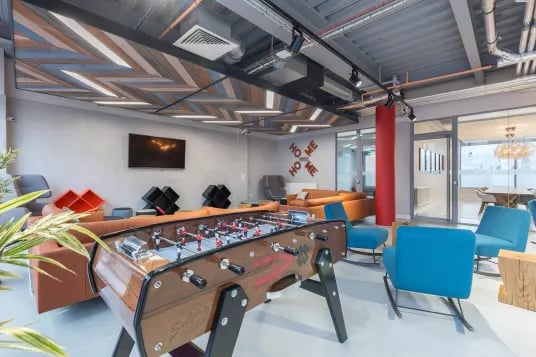 Foosball table lounge seating television living room at Livin Cardiff in Cardiff Student Accommodation